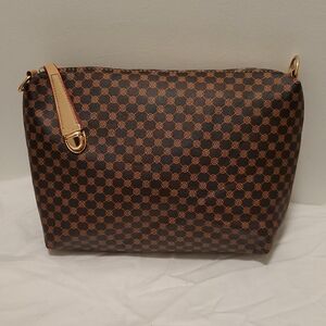 Designer Brown Patterned Women's Bag Is Medium Size And The Color Is Black And B